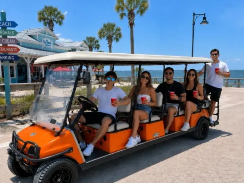 White golf cart on a sunny Florida street